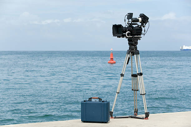 video camera and accessory bag on the dock positioned to record
